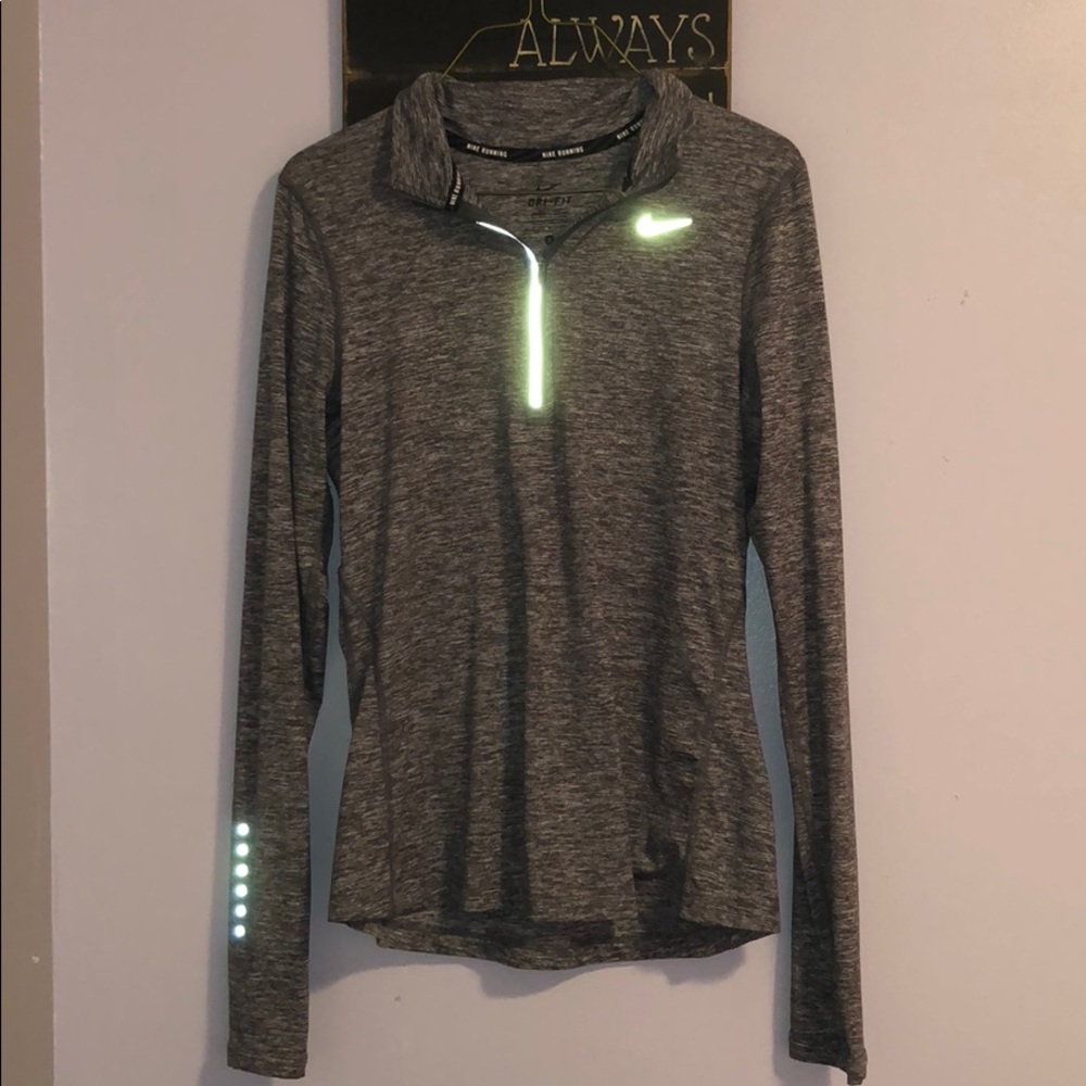 Reflective grey Nike running 1/4 zip. Size S